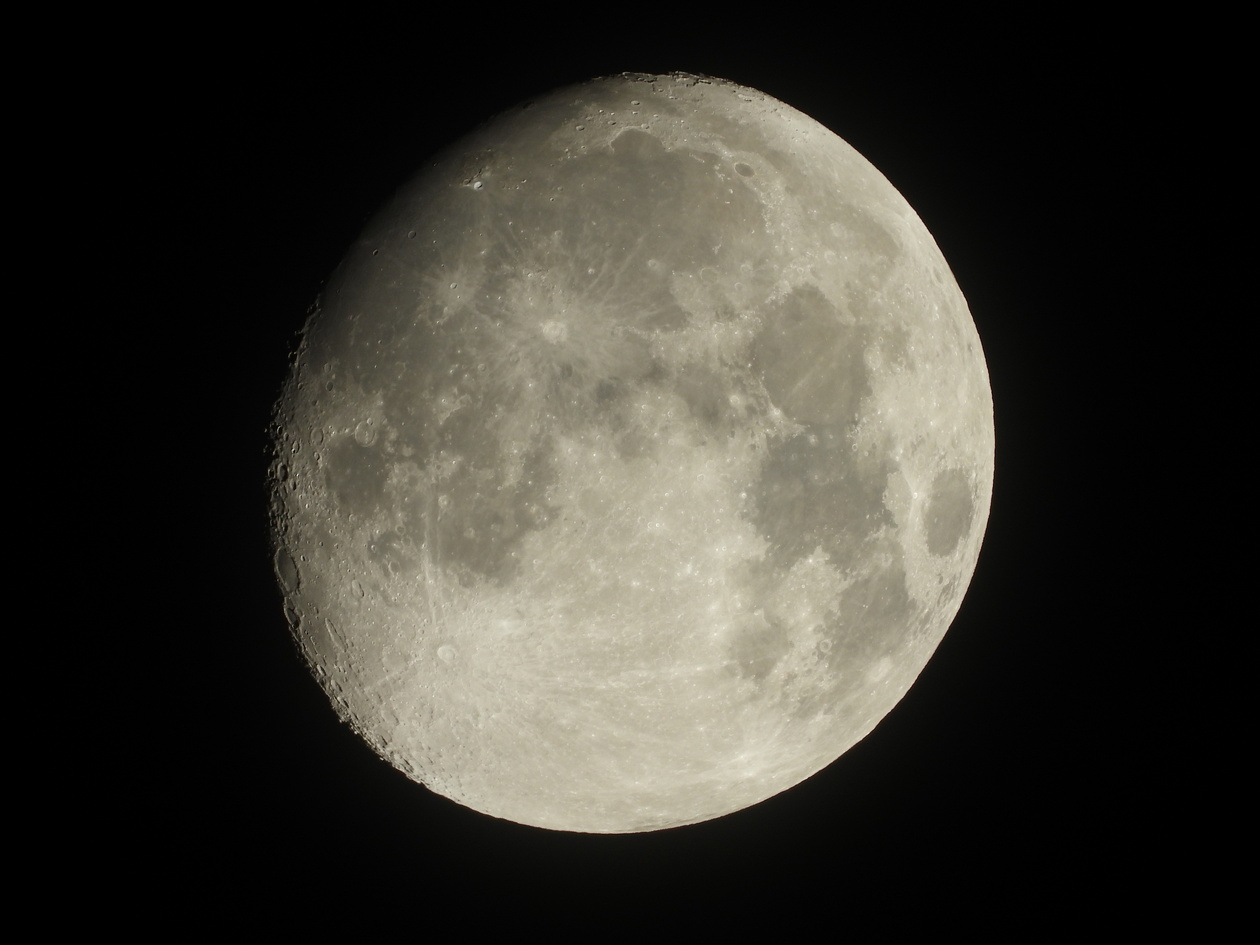The Moon in a gibbous phase against a black sky, filling most of the frame