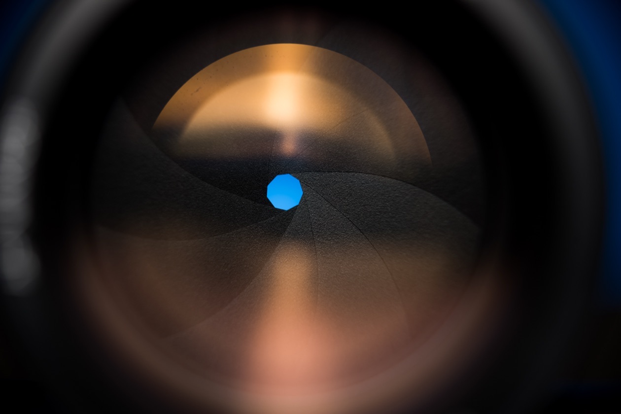 Lens aperture blades closed to a tiny opening