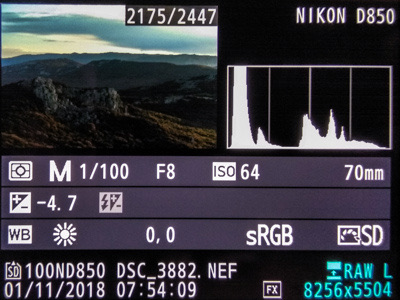 Playback screen of the same landscape at lower exposure with the right-edge peak gone