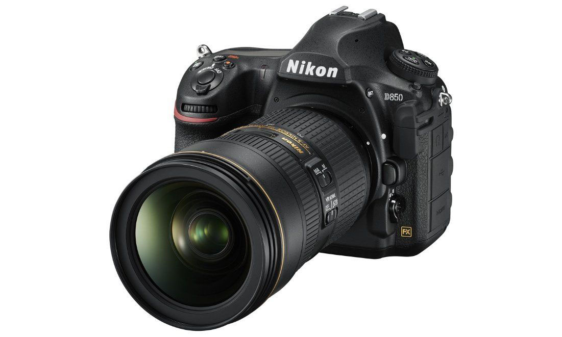Nikon DSLR with a wide-aperture zoom lens on a white background