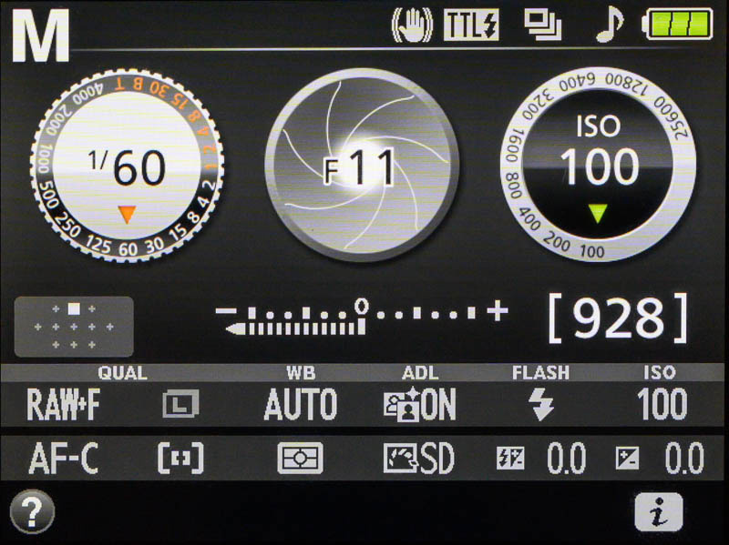 Camera information display showing F11 with a graphic of nearly closed aperture blades