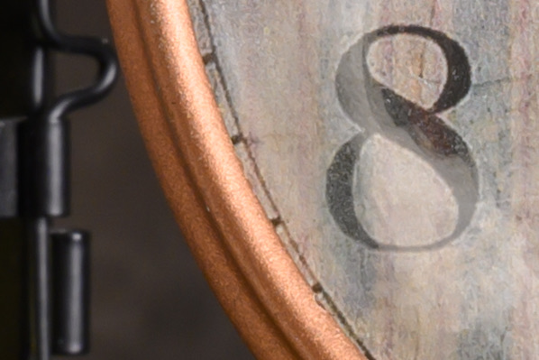 Crop of the clock dial at base ISO